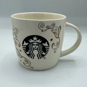 2018 Starbucks Holiday mug with siren logo and gold scrollwork